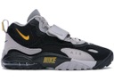 Example color photo of black and light grey Nike Air Max Speed Turf shoes with a yellow logo