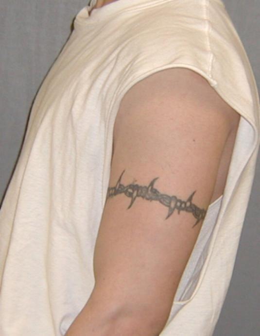 Tattoo on left arm
